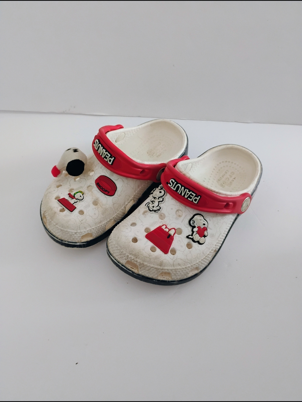 CROCS Kids White Clogs with Red Heel Strap and Peanuts Charms